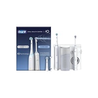 Oral-B Oral Health Center + iO Series 4 White set elektrického zubního kartáčku a ústní sprchy, bílá